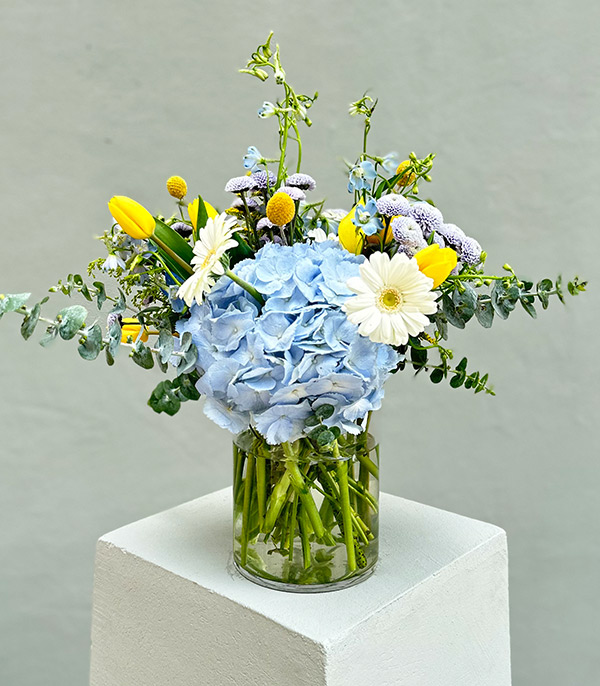 Aqua Blue Hydrangea Yellow Tulips Vase Arrangement