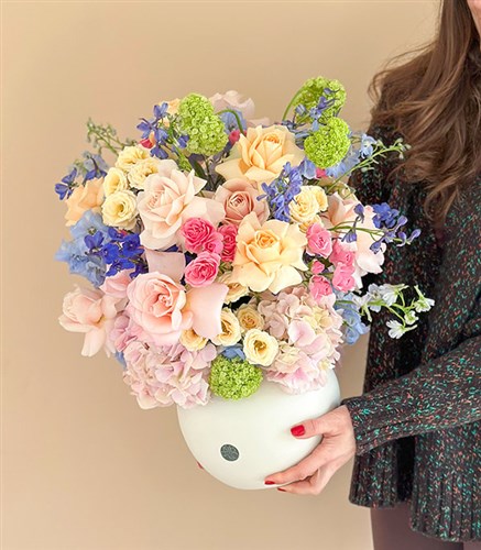 Caresse du Vent Panoramic Pink Blue Spring Flowers in Cream Ceramic Vase