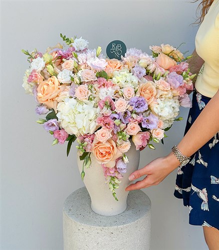 Pastel Flowers Arrangement in Petite Romance Deluxe Ceramic Vase