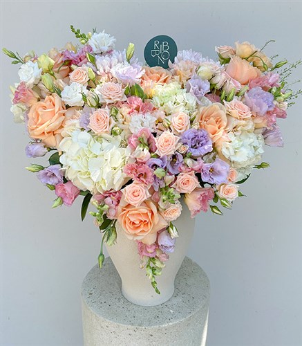 Pastel Flowers Arrangement in Petite Romance Deluxe Ceramic Vase
