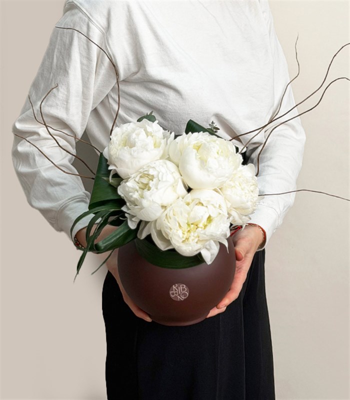 White Peony Arrangement in a Brown Ceramic Vase