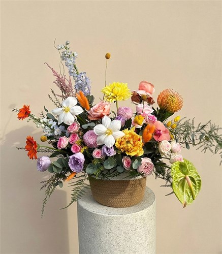 Colorful Wildflowers Arrangement in Deluxe Basket Limited Edition