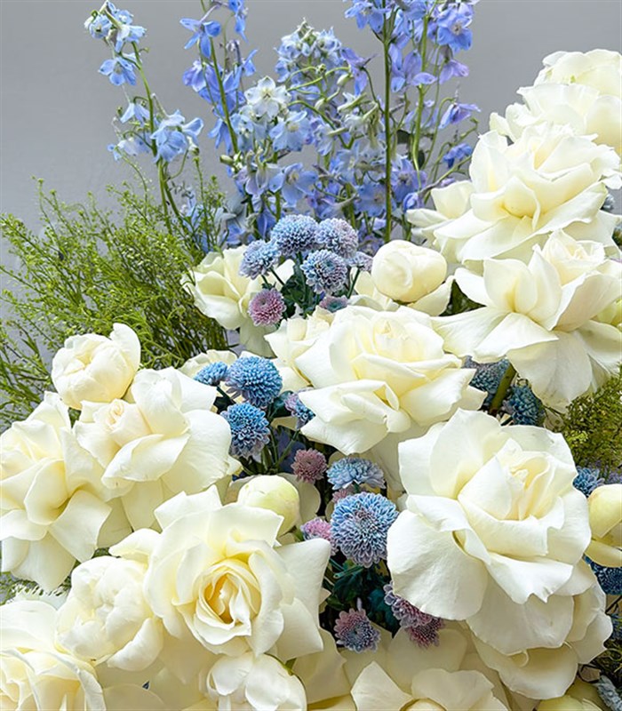 Royal Deluxe Arrangement of White Peonies, Roses, and Blue Delfinyum in a Silver Footed Vase