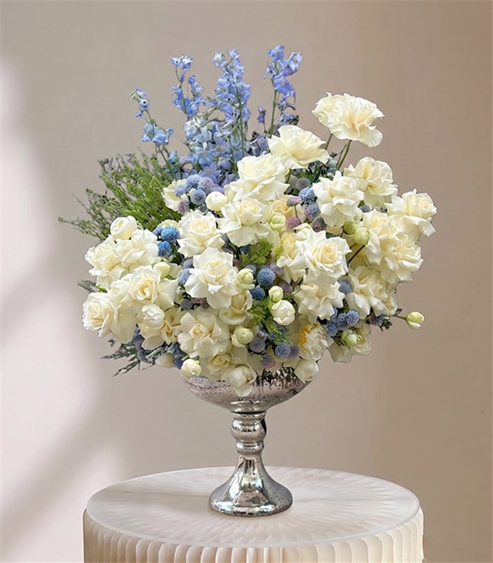 Royal Deluxe Arrangement of White Peonies, Roses, and Blue Delfinyum in a Silver Footed Vase
