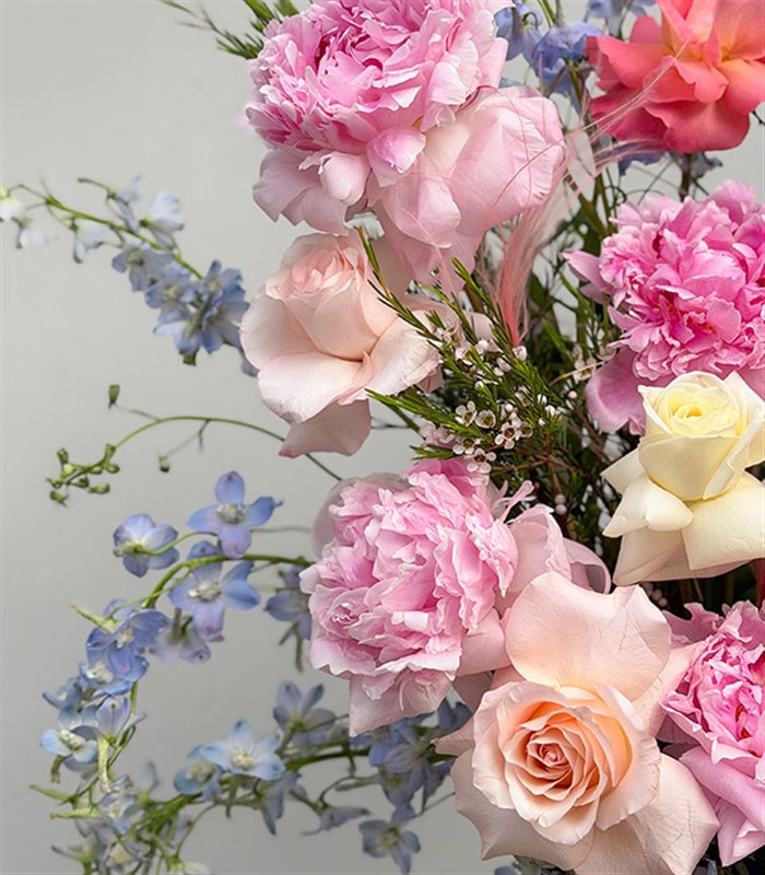 Backyard Beauty Deluxe Arrangement with Peonies in a Ceramic Pitcher and Vase