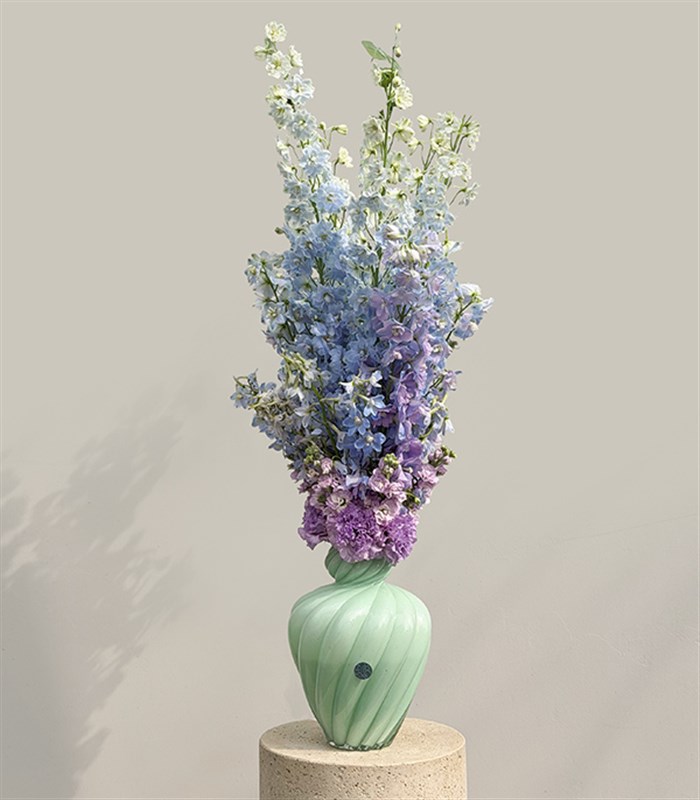 Ombre Ciel Limited Edition Blue Delphinium Arrangement in Mint Vase