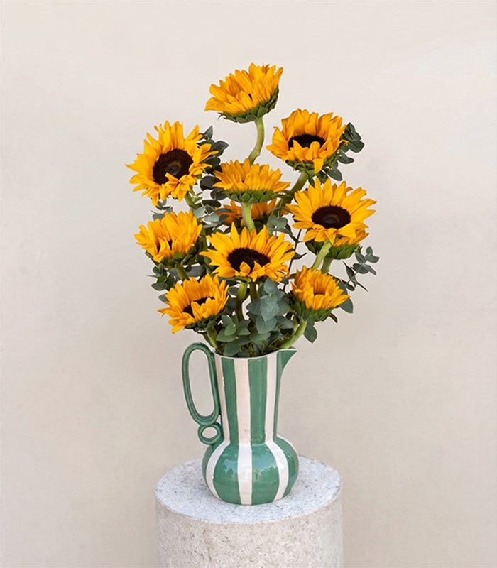 Sunflowers in a Handmade Green Ceramic Pitcher