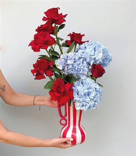 Striped Romance Deluxe Handmade Ceramic Pitcher with Blue Hydrangea and Red Rose Arrangement