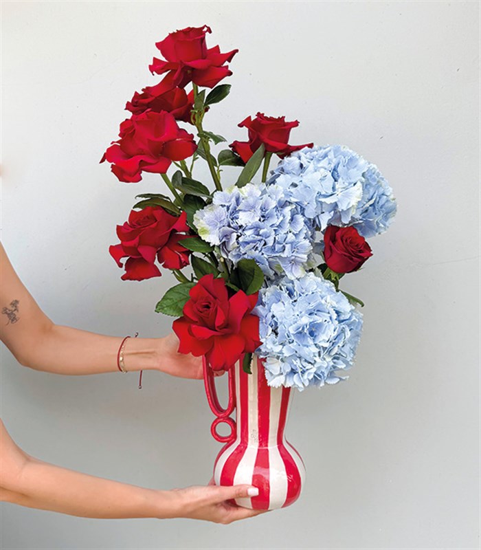 Striped Romance Deluxe Handmade Ceramic Pitcher with Blue Hydrangea and Red Rose Arrangement