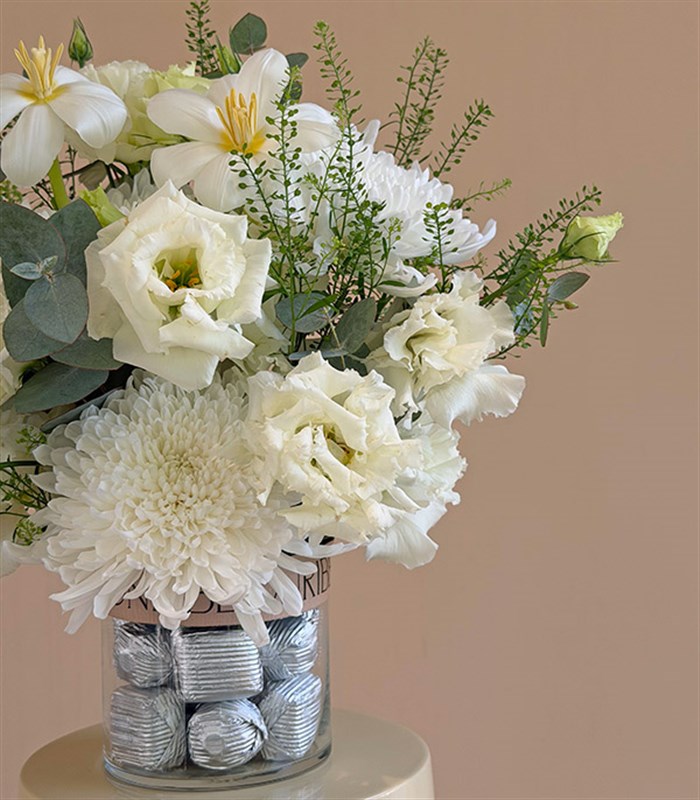Fusion White Roses Anastasia Chocolate Vase Arrangement