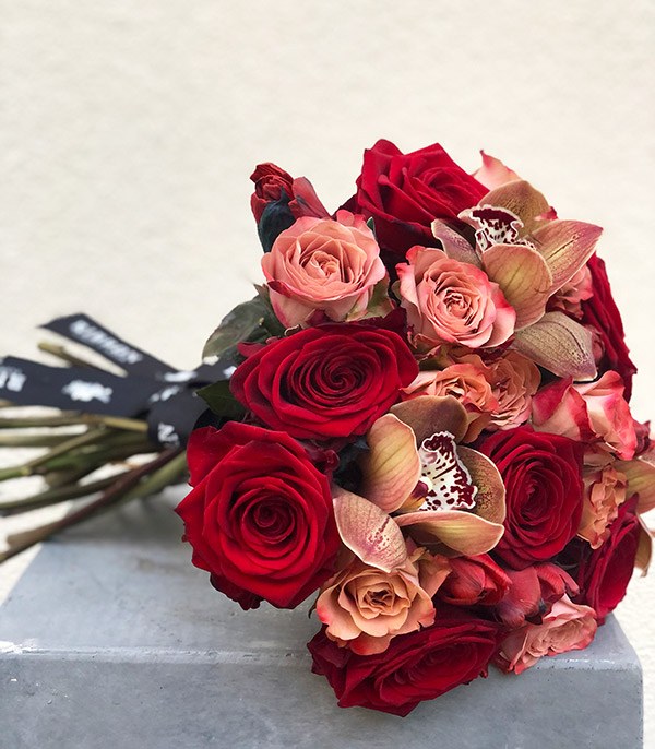 Deluxe Love Song Cappucino Red Roses Bouquet