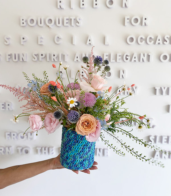Estelle Soft Flowers in a Turquoise Knitted Box