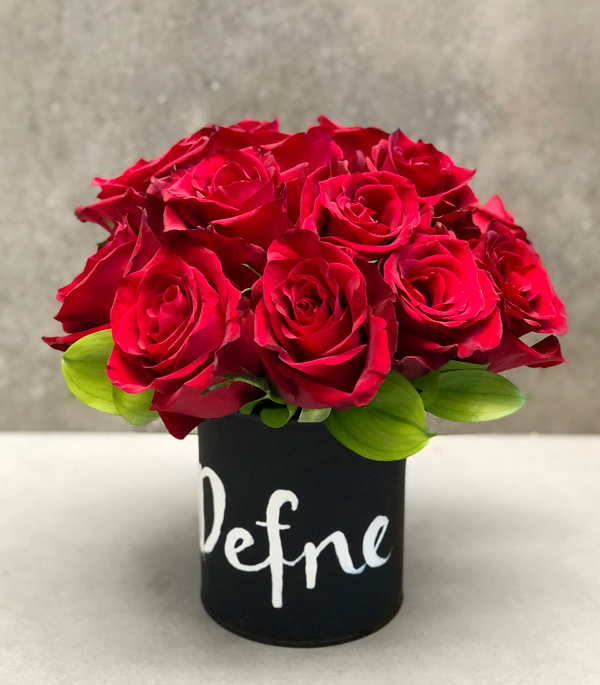 Red Roses in Black Vase