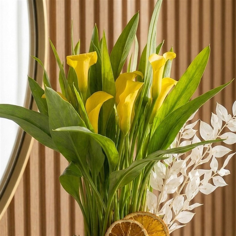 Yellow Calla Lily Arrangement in Glass Vase