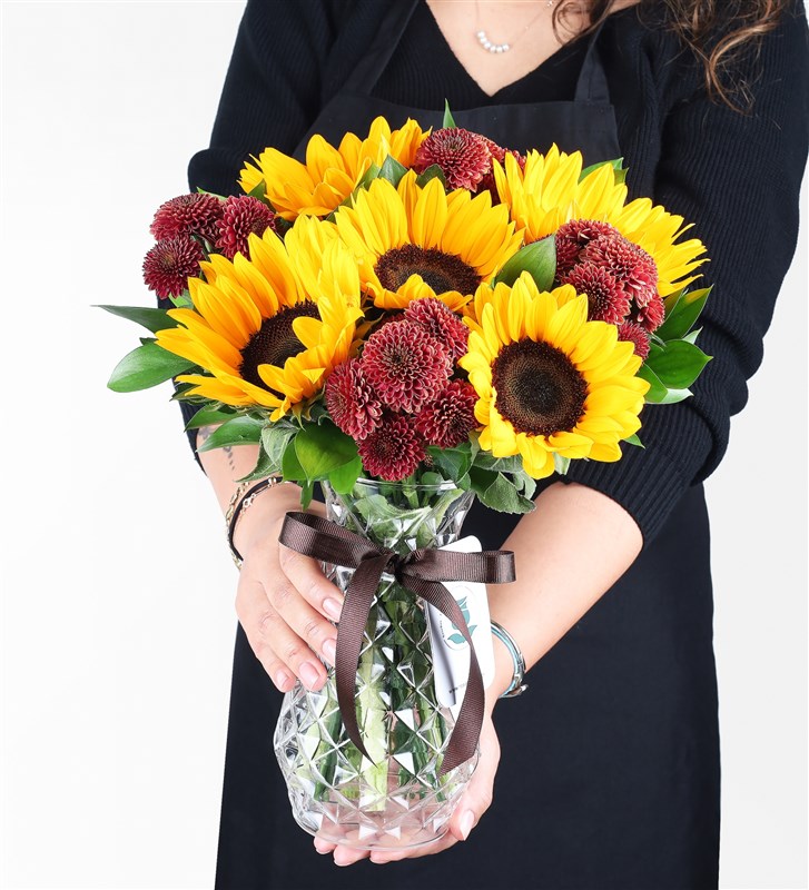 Sunflower and Brown Grass Arrangement in a Glass Vase