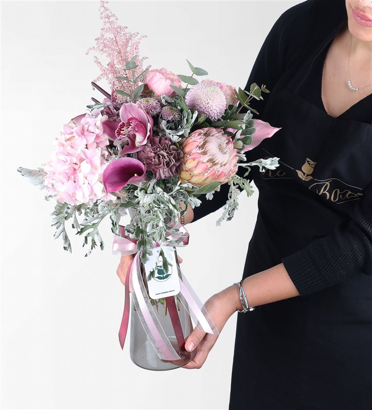 Pink Gala, Protea, Anthurium, and Hydrangeas in a Glass Vase