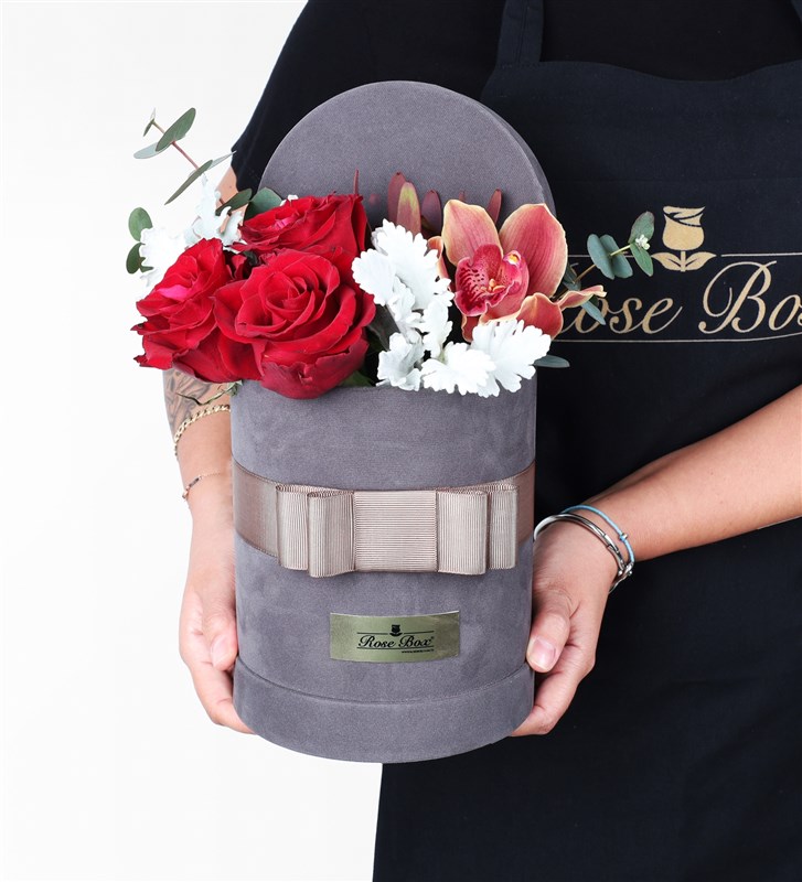 Red Roses and Orchids in a Grey Velvet Box