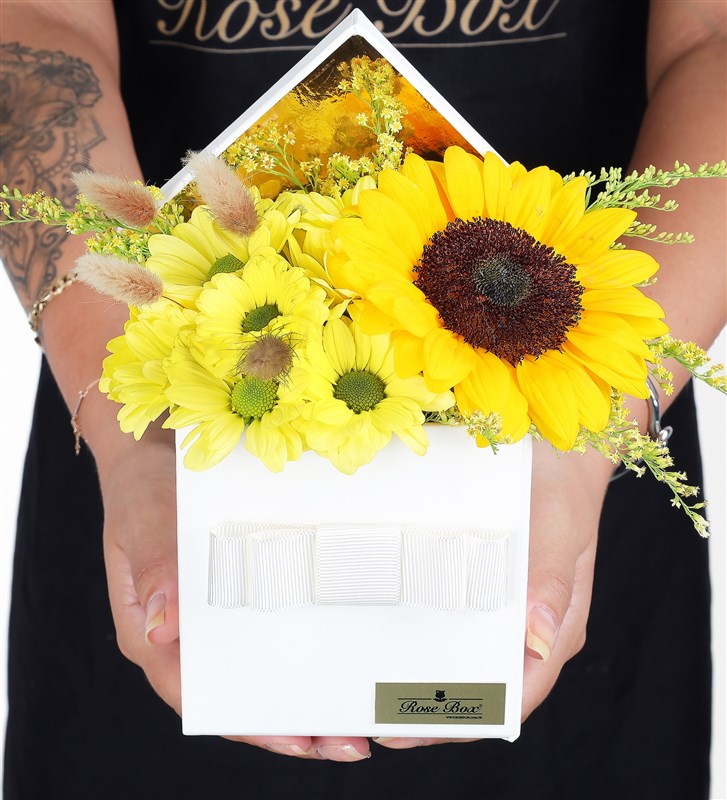 Arrangement of Yellow Daisies and Sunflowers in a White Box