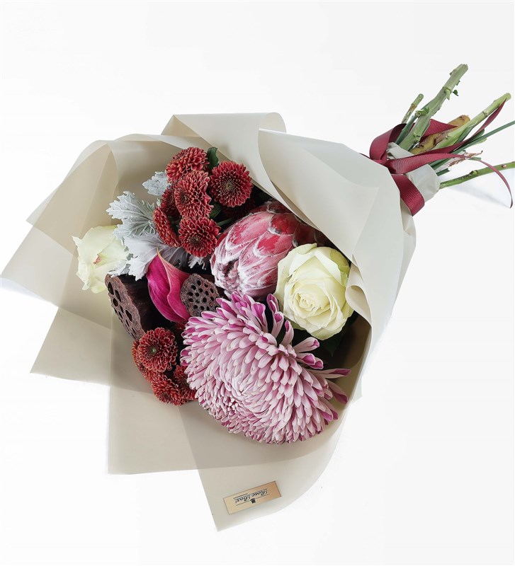 Coral - Protea Anastasia Gala and Lotus Flower Bouquet