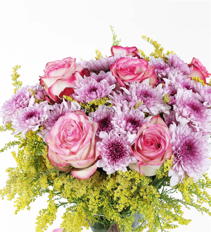 Arrangement of Pink Daisies and Pink Roses in a Glass Vase