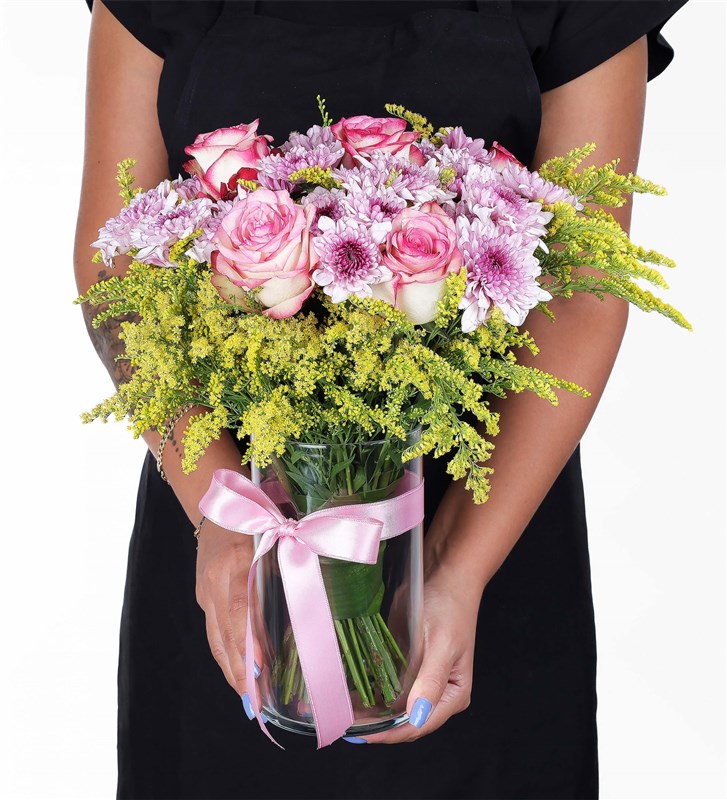 Arrangement of Pink Daisies and Pink Roses in a Glass Vase