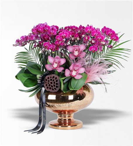 Giant Purple Orchid Arrangement in an Antique Copper Glass Vase