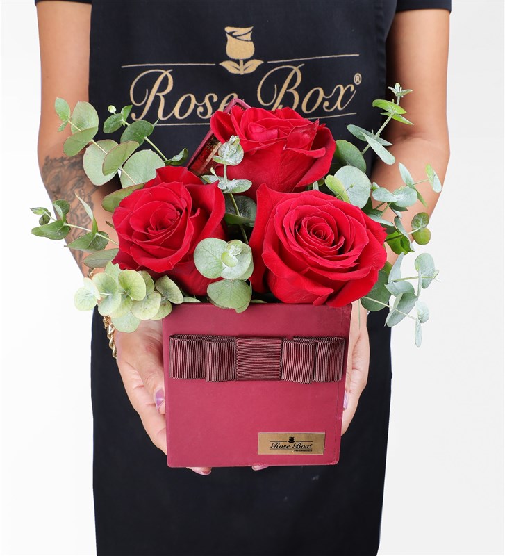 Three Red Roses in a Burgundy Box