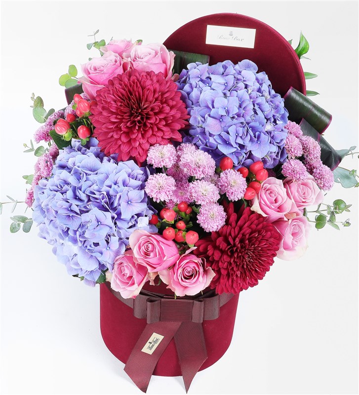 Purple Hydrangeas, Anastasia, and Pink Roses in a Burgundy Box