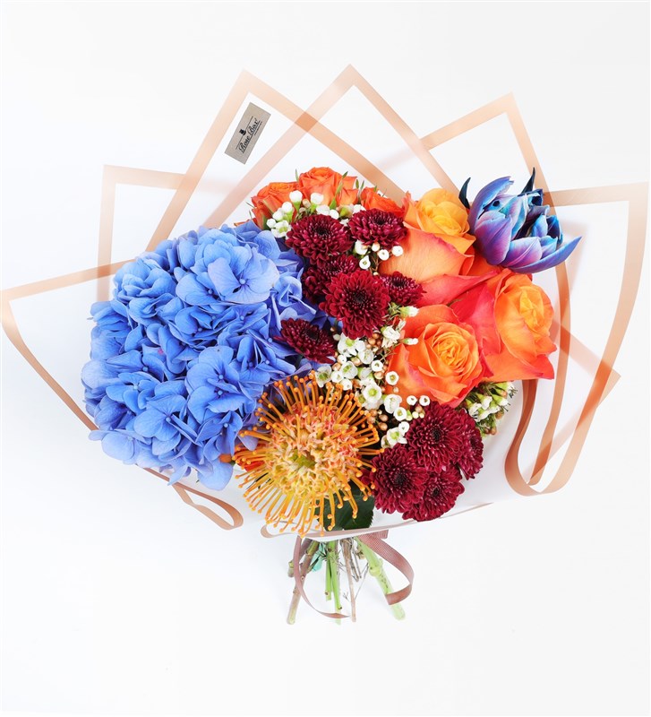 Wild Bloom Bouquet - Blue Hydrangea, Lecuspermum, Orange Ecuadorian Roses, Galaxy Tulip and Prupetta Red Santini